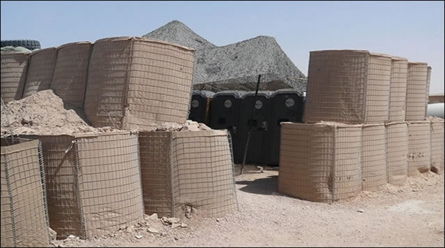 Gabions lined with geotextile filled with sand for safety wall barrier